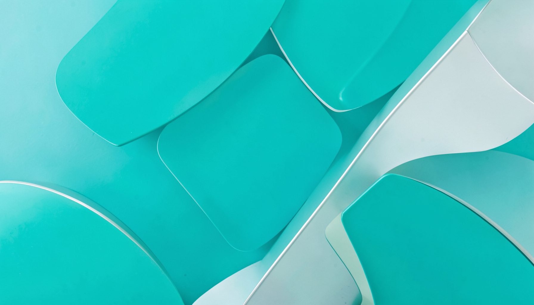 Cool teal and silver abstract shapes with a fresh, modern pop sensibility