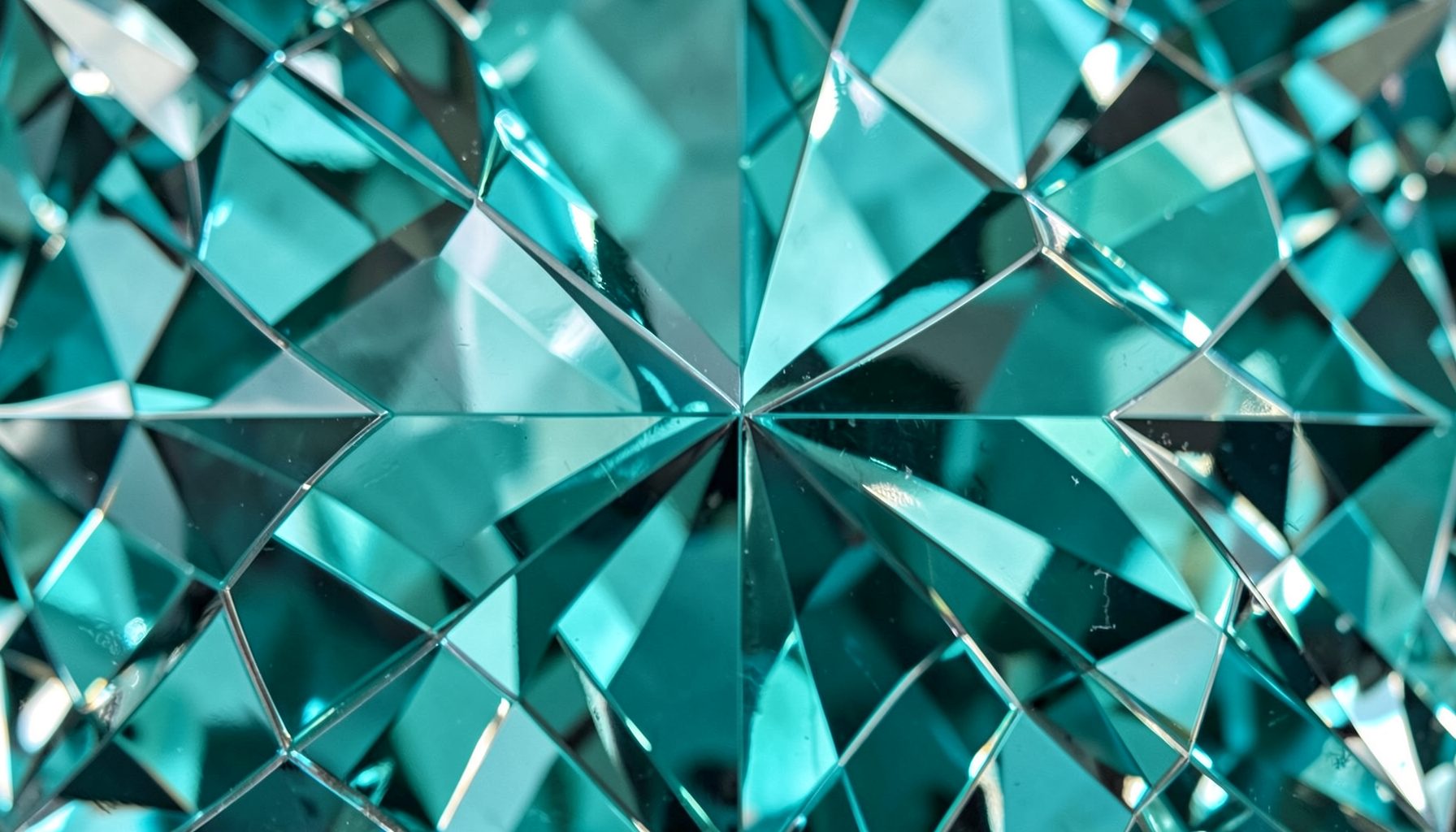 Cool teal and silver tones with a faceted crystalline pattern