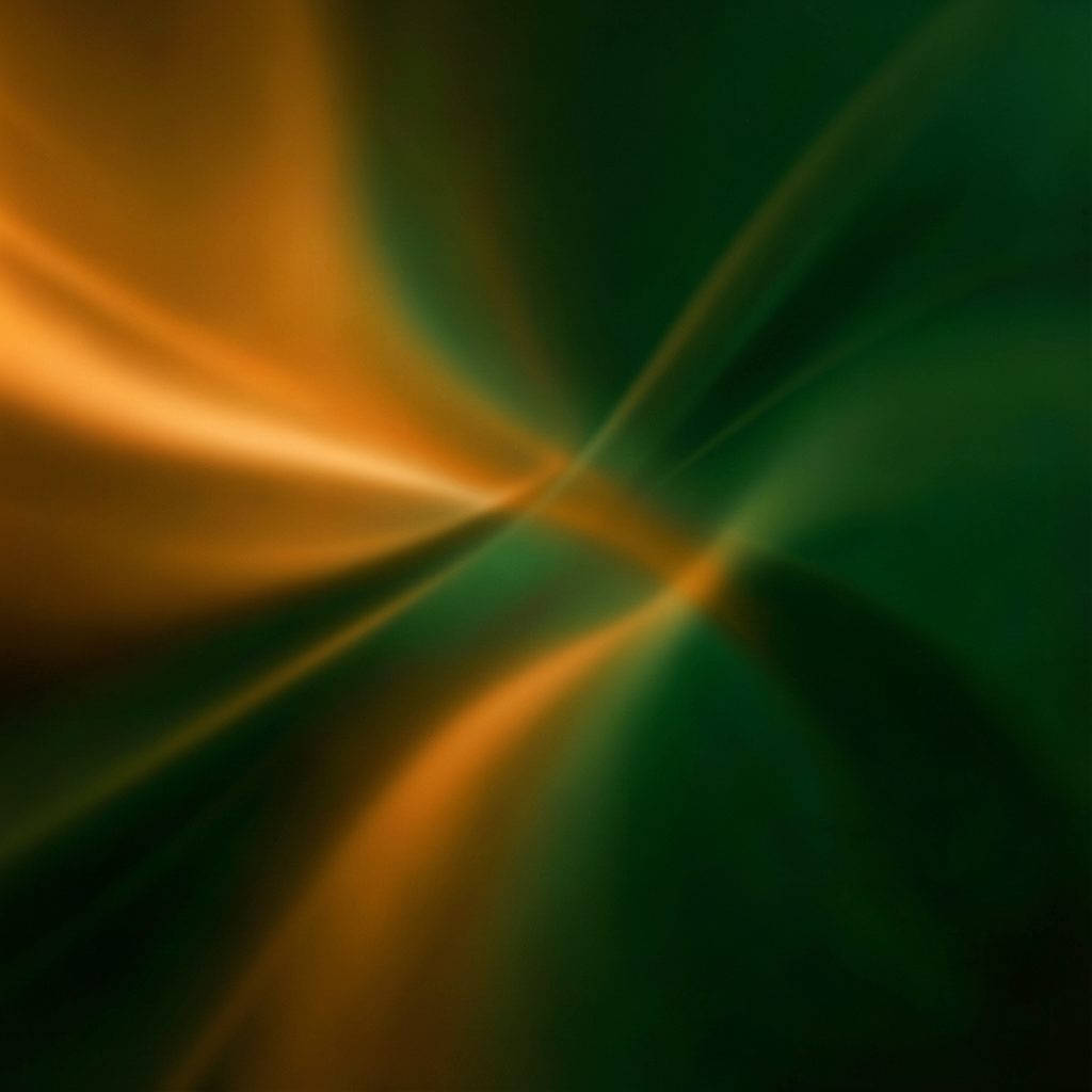Warm amber and deep green abstract music visual with soft blurred motion